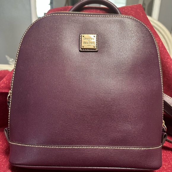 Dooney & Bourke Handbags - Dooney & Bourke Purple Backpack with Gold Accents